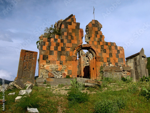 Abandoned ruins of the medieval church Amenaprkich in the monastic complex Havuts Tar, damaged during the earthquake, Khosrov State Reserve, near the village Garni, Armenia photo