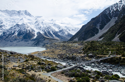 Hooker river and Mueller lake with snow covered mountains on Hooker Valley Track  South Island  New Zealand