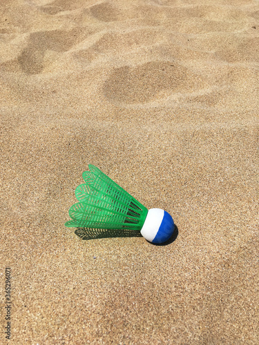 badminton shuttlecock on the sand