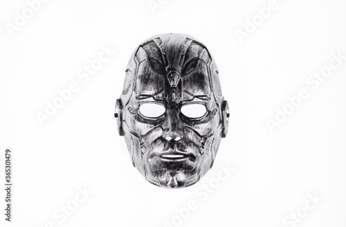 Konstfotografi halloween metal mask on white background
