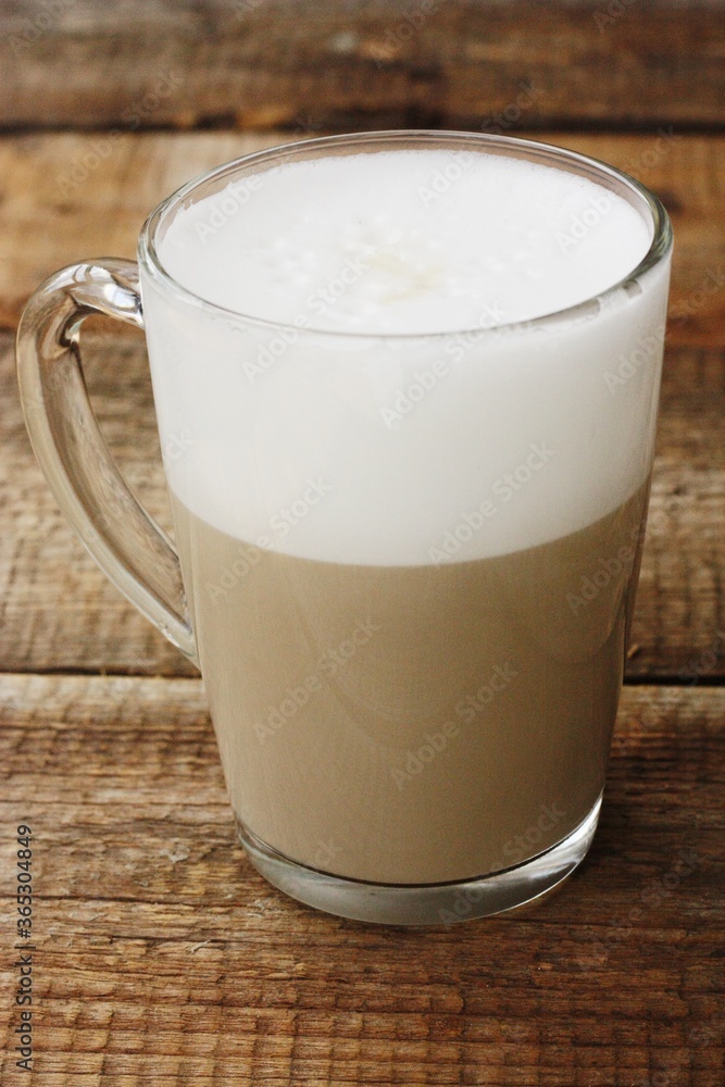Coffee cappuccino with milk on the table Coffee cappuccino with milk on the table