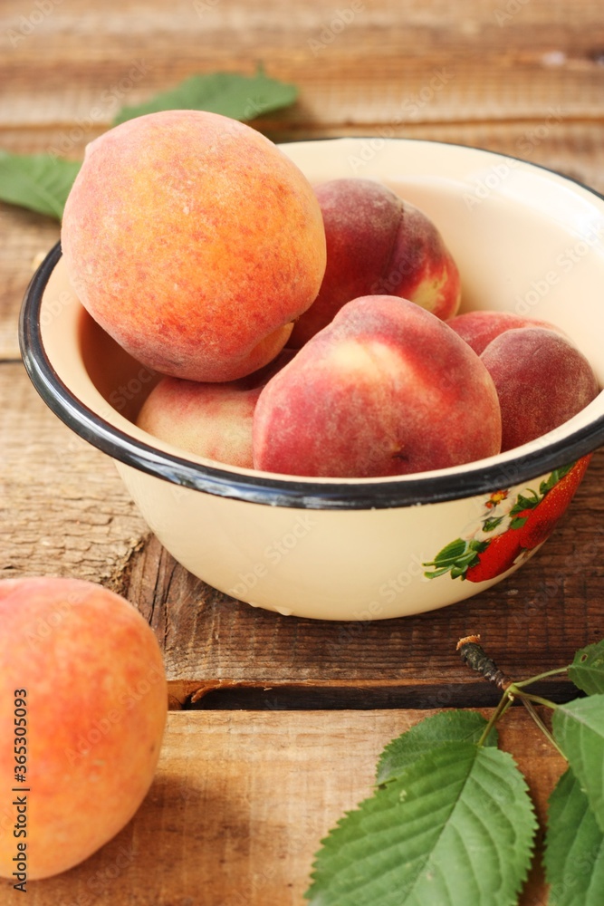 Juicy peaches on a wooden table macro Juicy peaches on a wooden table macro