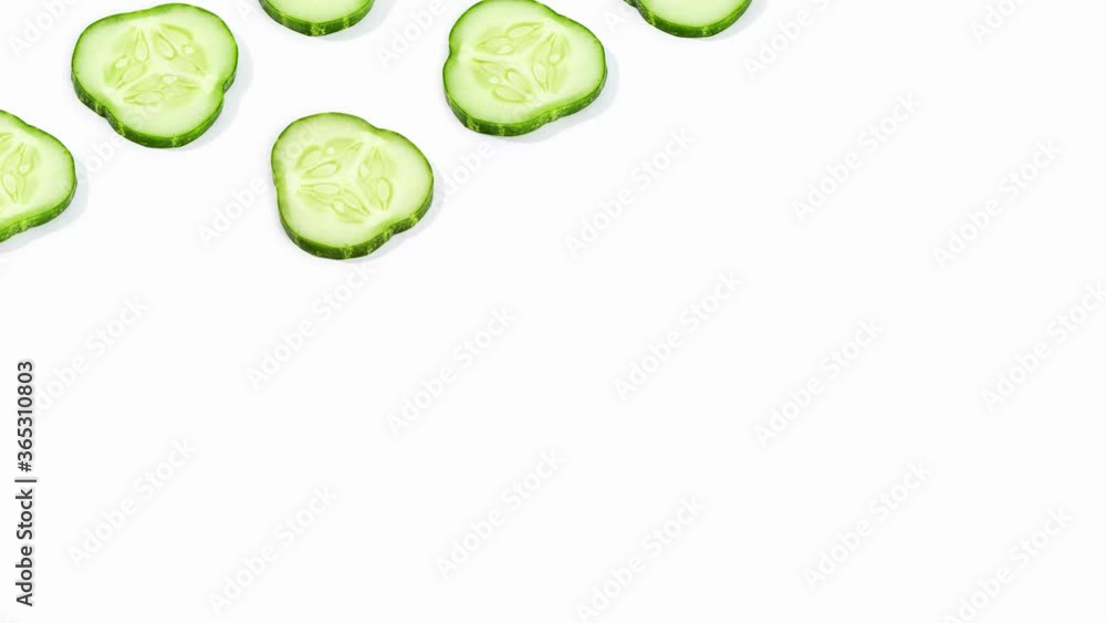 Cucumber slices pattern isolated on white background. Time lapse Cucumber slices pattern isolated on white background. Time lapse