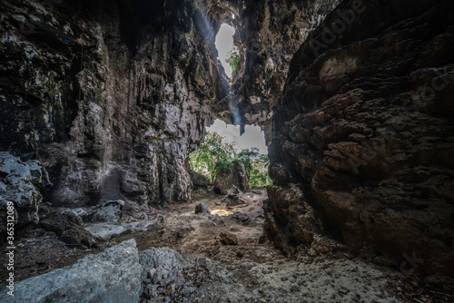 Limestone cave with shining light 