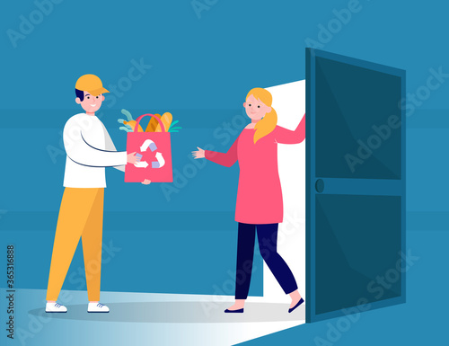 Smiling young courier delivering bag from grocery store. Door, order, food flat vector illustration. Shopping at home and delivery concept for banner, website design or landing web page