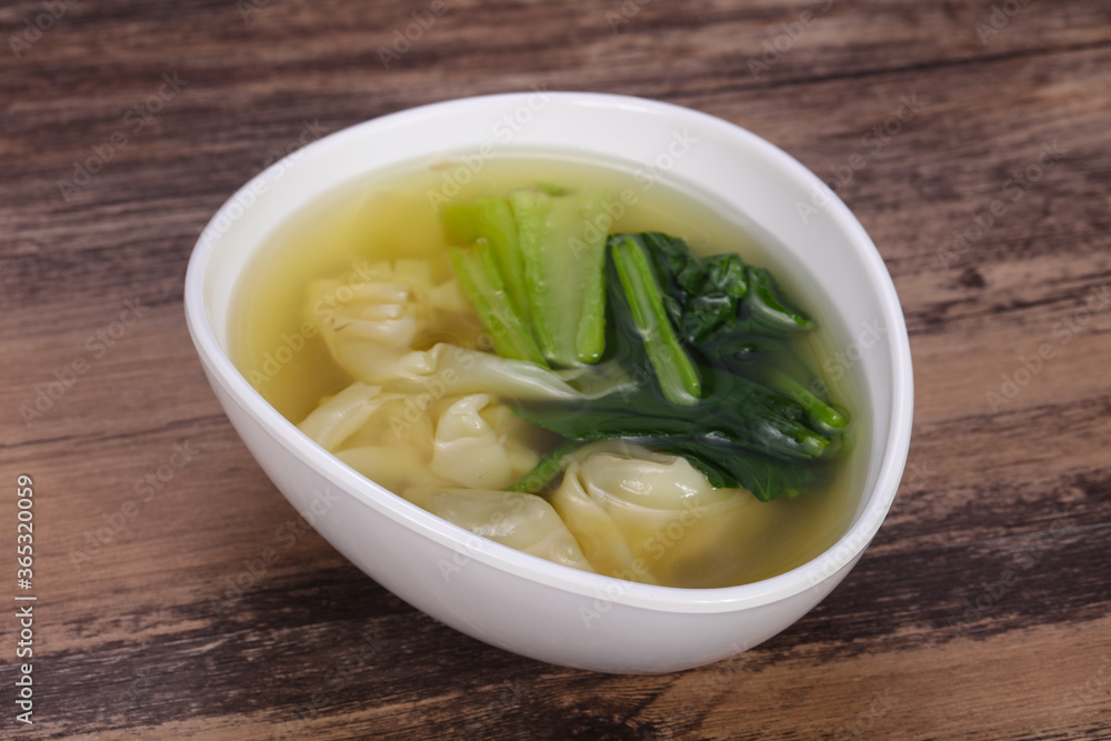 Asian traditional Wonton soup with herbs Asian traditional Wonton soup with herbs