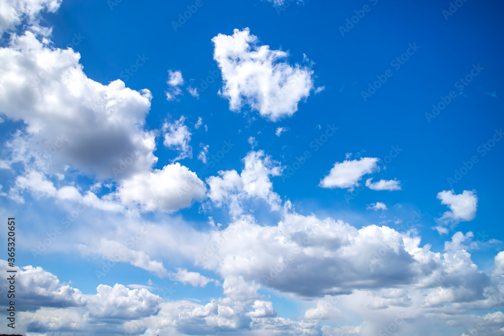 Obraz premium Blue sky with white clouds. Beautiful background.