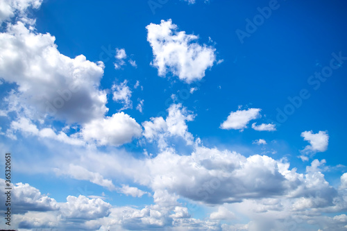 Blue sky with white clouds. Beautiful background.
