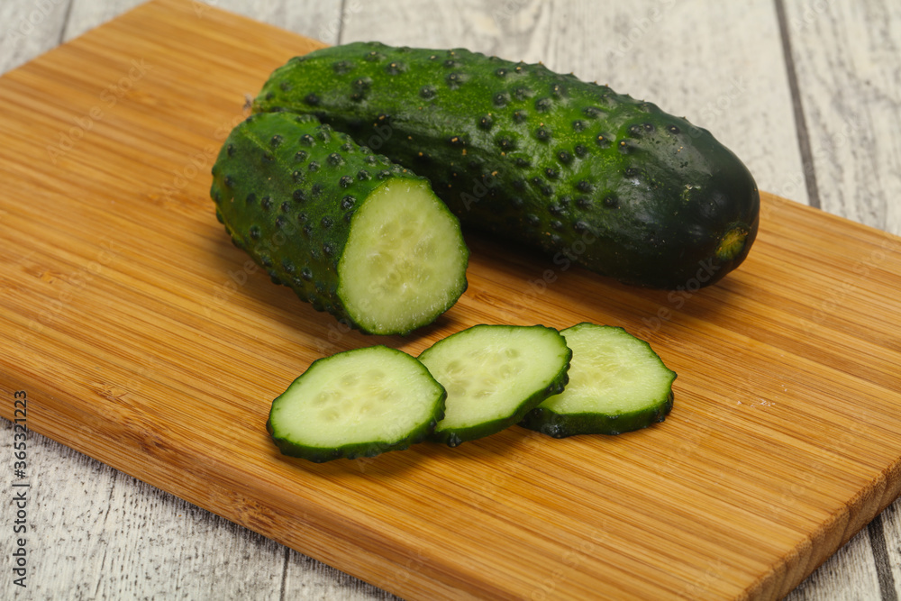 Ripe fresh green two cucumbers Ripe fresh green two cucumbers