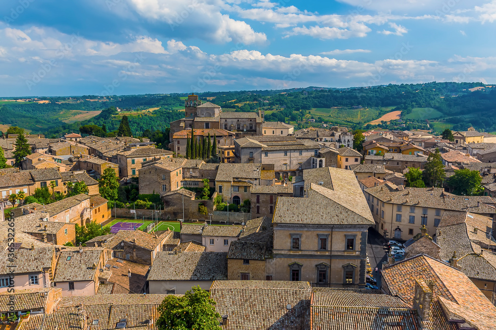 Sunshine highlights the roof tops of Orvieto, Italy in summer