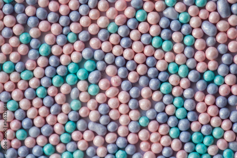 Sugar sprinkle dots, decoration for confectionery. High magnification macro. Sugar sprinkle dots, decoration for confectionery. High magnification macro.