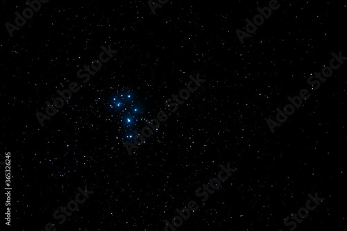 pleiades constellation seen from a telescope