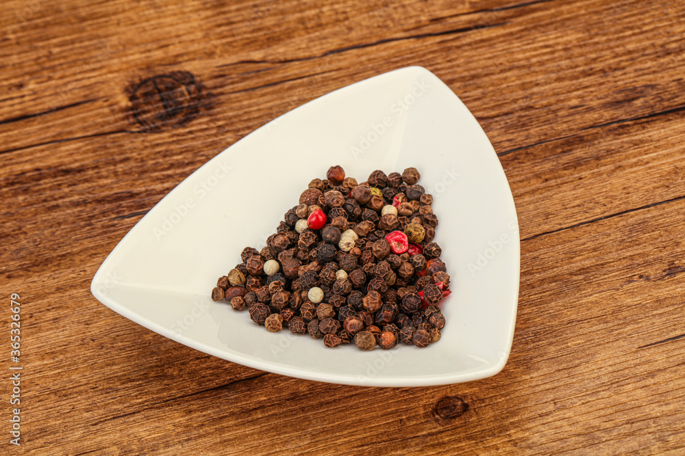 Peppercorn heap in the bowl Peppercorn heap in the bowl