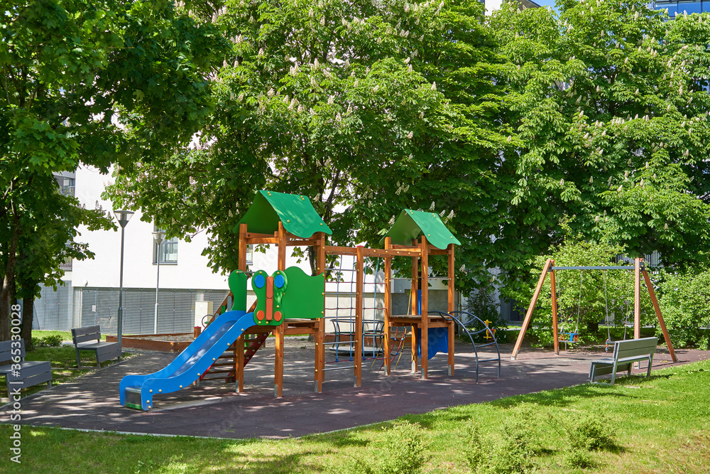 Children playground in the park on a sunny day Children playground in the park on a sunny day