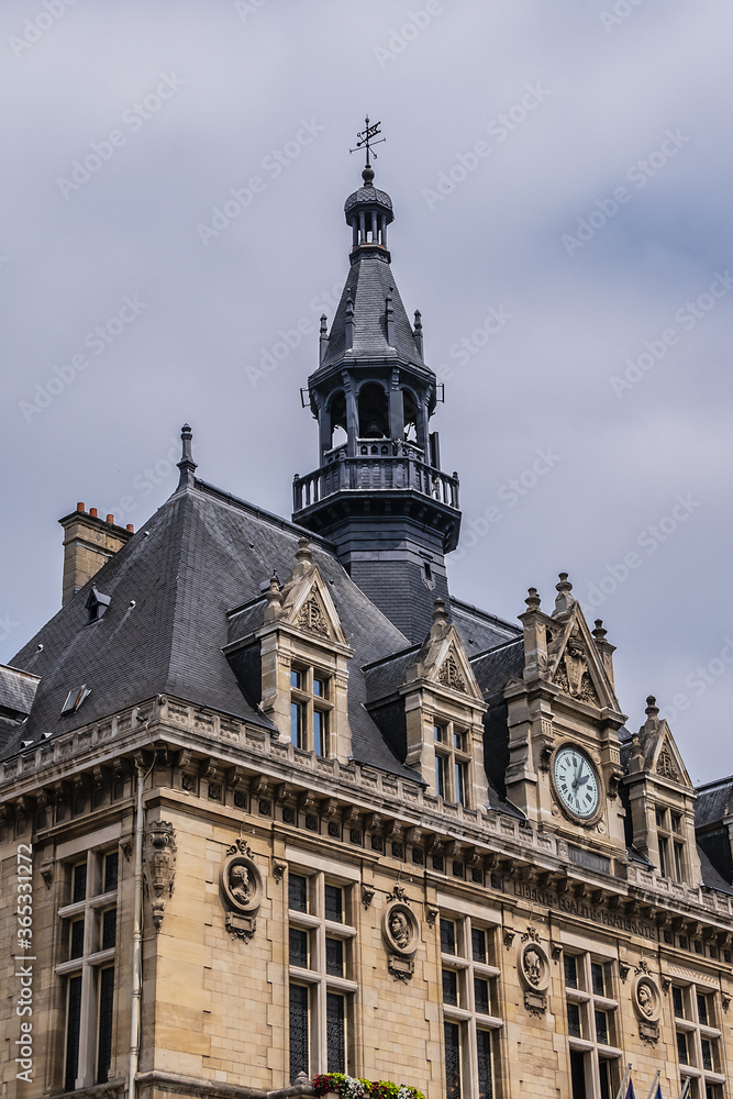 Architectural fragments of Vincennes Hotel de Ville (1887 - 1891) or Town hall of Vincennes. Vincennes - a commune in the Val-de-Marne department in the eastern suburbs of Paris, France.