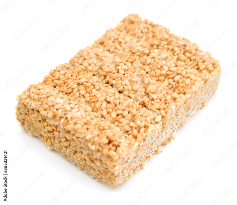 Honey bars with sesame seeds on white background Honey bars with sesame seeds on white background