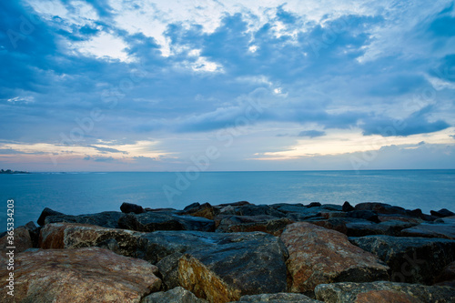 A beautiful seascape with dramatic sky - Sunrise over the sea in Kanyakumari town, Tamil Nadu in Indian sub continent.