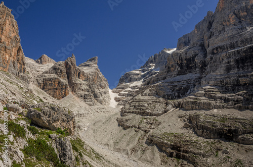 Castelletto Inferiore, Castelletto Superiore, Cima Sella, Campanile di Vallesinella, Punta Massari summits, as seen from the trail to Rifugio Tuckett, Brenta Dolomites, Italy.