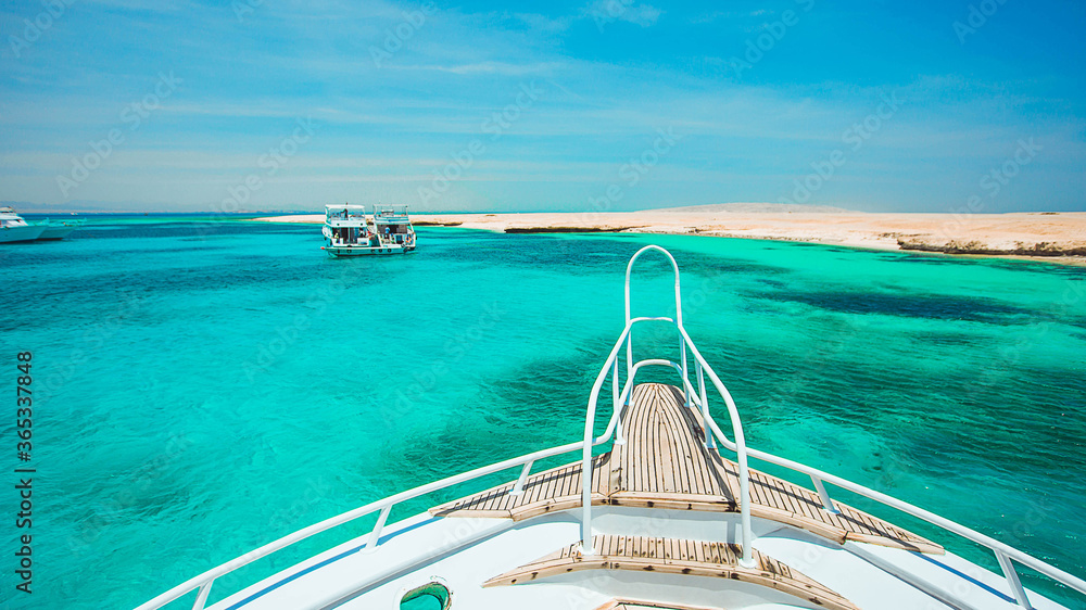 View from the yacht to the turquoise sea and island