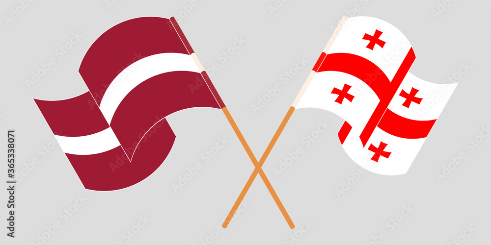 Crossed and waving flags of Georgia and Latvia Crossed and waving flags of Georgia and Latvia