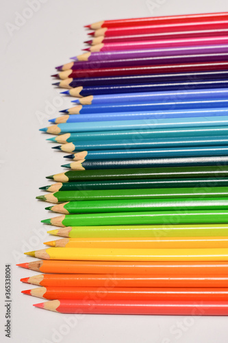 Colored pencils isolated on a white background