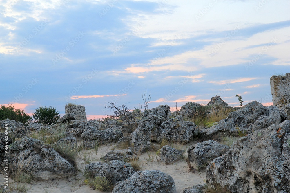 Pobiti Kamani (stone desert), a phenomenon located on the North-Western border of the Varna region in Bulgaria at sunset