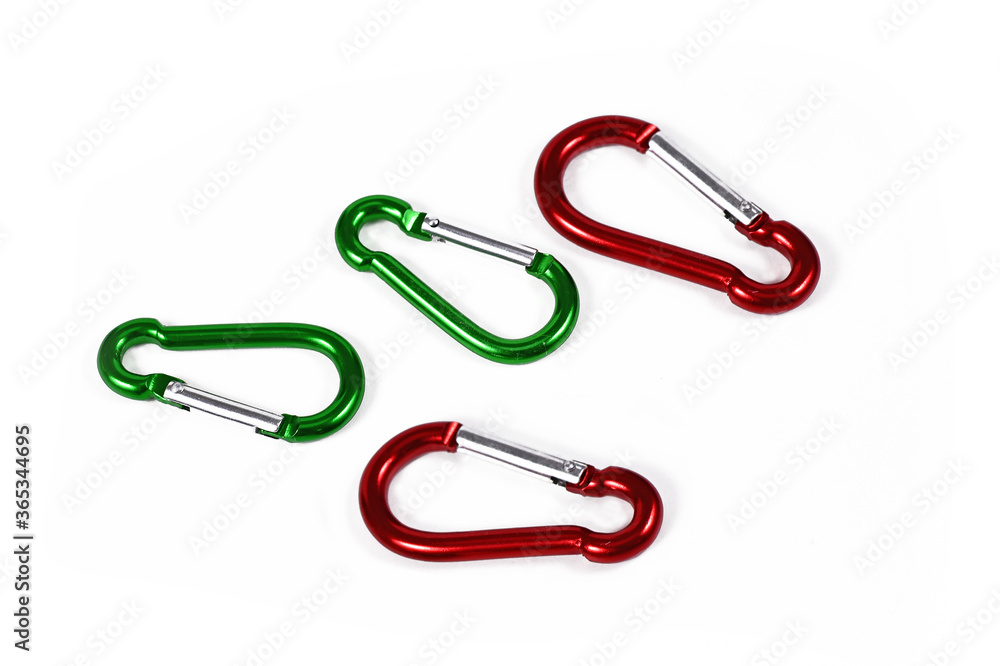 Green and red snap hooks isolated on white background Green and red snap hooks isolated on white background