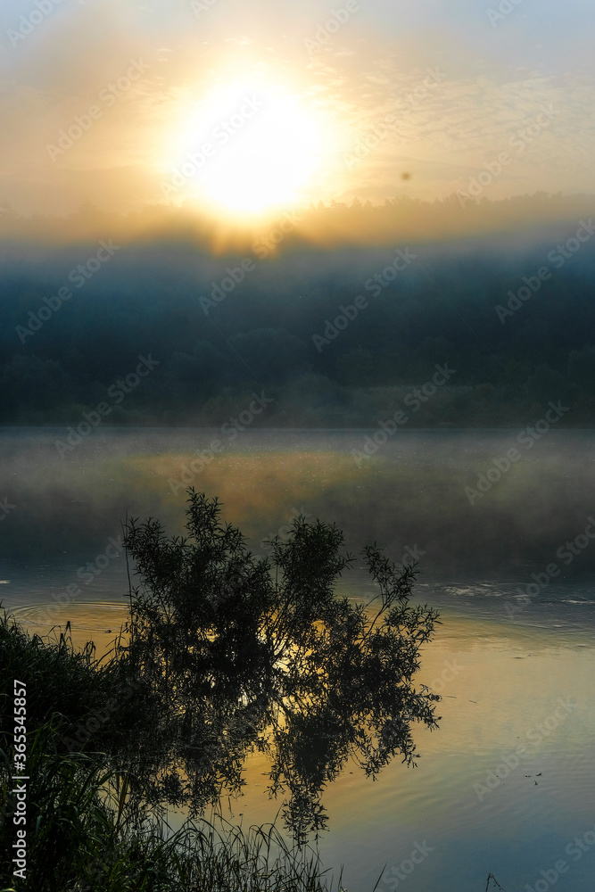 Naklejka premium landscape with the image of morning over the river