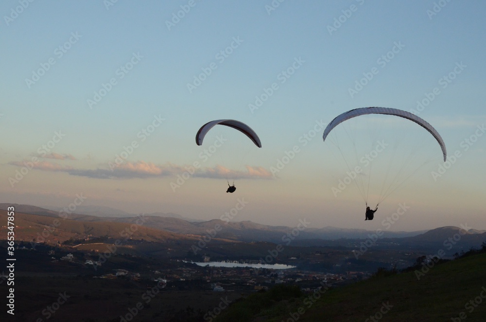 Two Paraglidings at sun set in Topo do Mundo (translated to Top of the World) in Minas Gerais Two Paraglidings at sun set in Topo do Mundo (translated to Top of the World) in Minas Gerais
