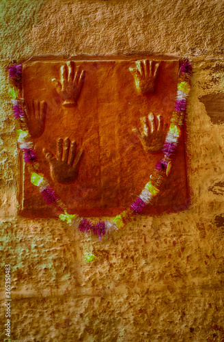 Satee hands memorial to widows who threw themselves on husband's funeral pyre photo