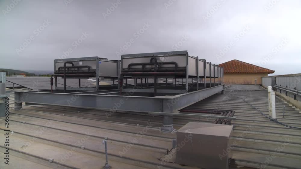 HVAC Air Conditioning Units on a Rooftop Building HVAC Air Conditioning Units on a Rooftop Building