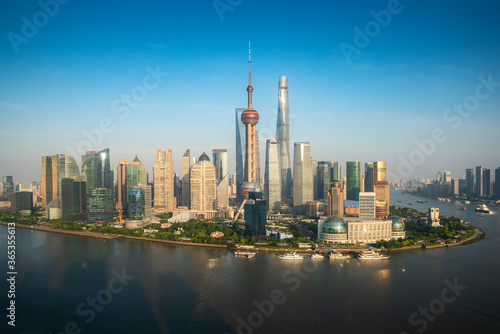 Aerial view of Pudong skyline with Oriental Pearl tower and Lujiazui Business district skyscraper with Huangpu river in Shanghai  China. Asian tourism  modern city life  or business finance concept