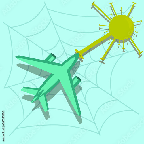 a stranded plane in a web created by a coronavirus. The concept of stopping air traffic and bankruptcy of airlines