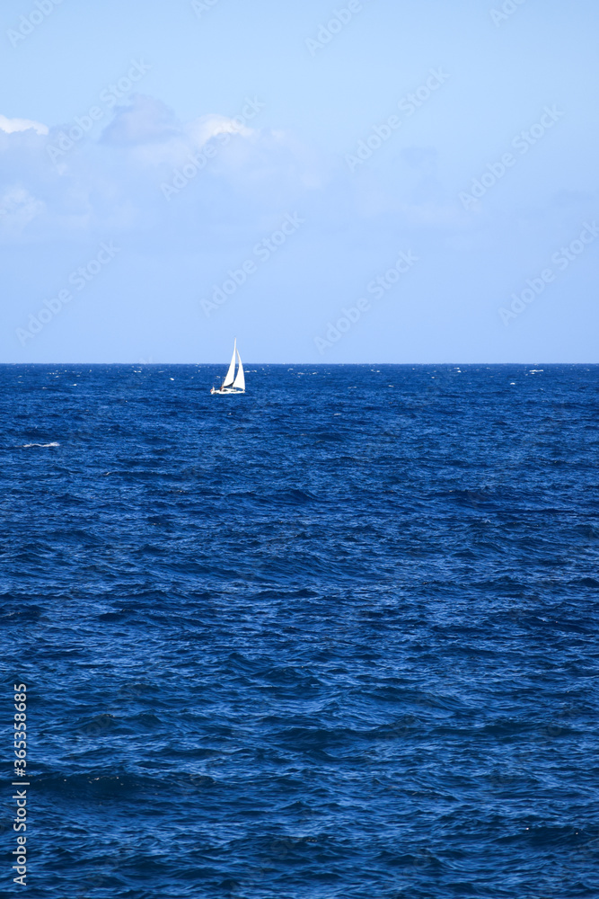 Boat sailing in the ocean (Spain)