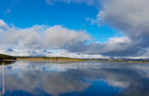 Jenny Lake in Grand Tetons Wyoming with beautiful cloud formation reflection on the lake