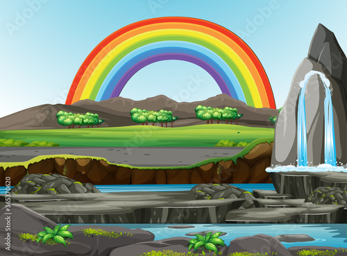Nature forest view with rainbow in the sky scene