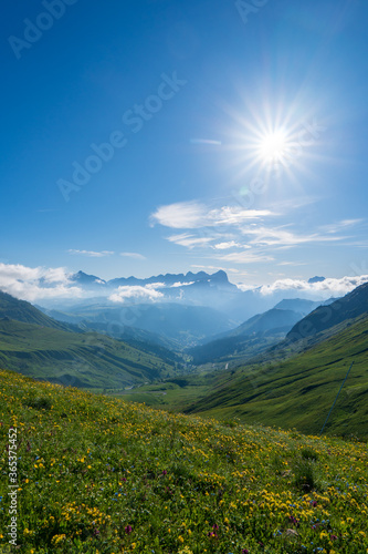 Panorama of the Piz Boe mountain range at sunny foggy morning. View from Pordoi pass. Dolomites mountains  Italy  Europe.