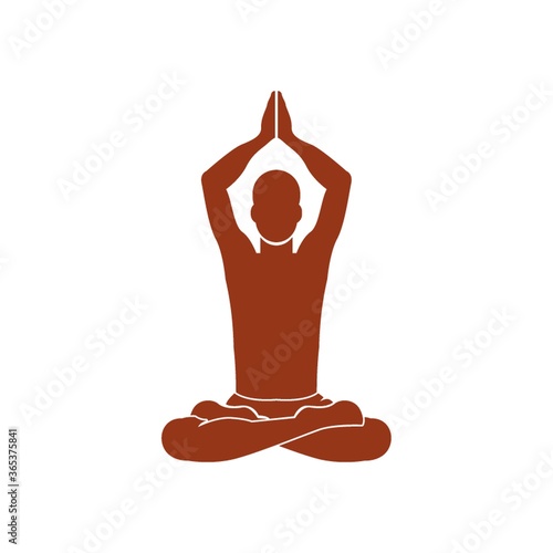 man practicing yoga in lotus pose
