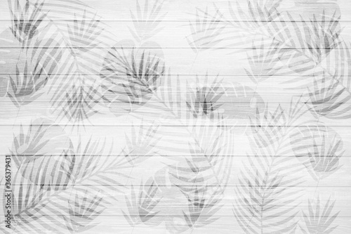 The leaf pattern on a white plank floor can be used as a background.