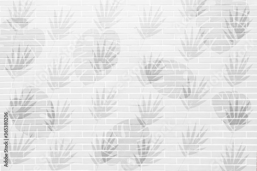 The leaf pattern on the  brick wall can be used as a background.