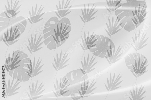 The leaf pattern on the  brick wall can be used as a background.