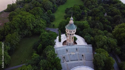 Aerial top down shot of famous water tower and outdoor stage theater on margaret island in Budapest photo