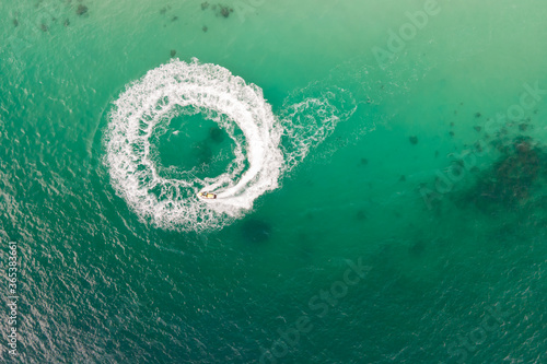 A top view of a circular wave from jet ski at the sea