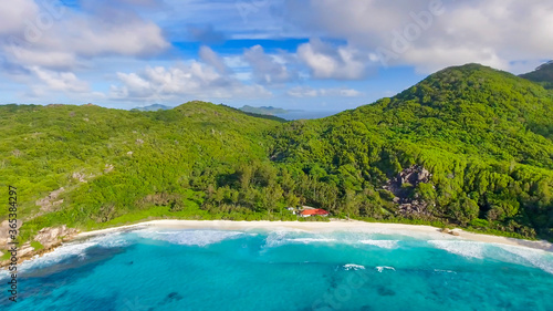 Aerial view of tropical island with sea, vegetation and shoreline © jovannig