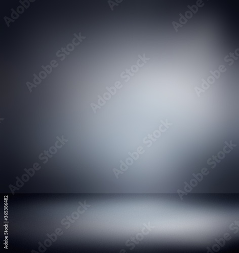 3d dark grey empty room blur background. Spotlight on black wall and floor texture. Basement defocused backdrop.