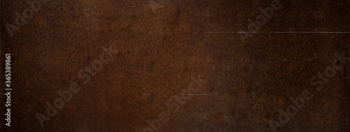 Textured banner of weathered cardboard material, grunge background 