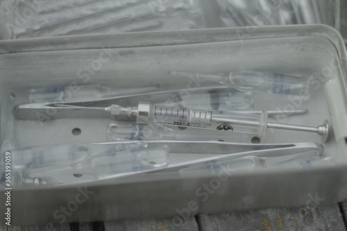 Medical instruments. Reusable syringe, tweezers, ampoules. Medical prevention.