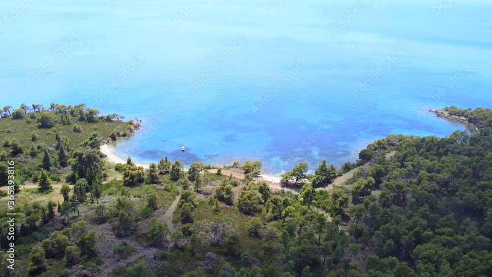 Relaxing quiet place on sea coast with sandy beach and greenery. Aerial view Relaxing quiet place on sea coast with sandy beach and greenery. Aerial view