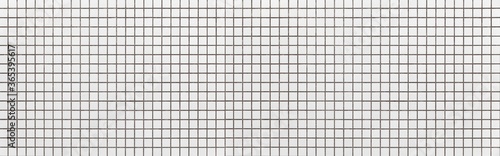 Panorama of white mosaic tile pattern and seamless background