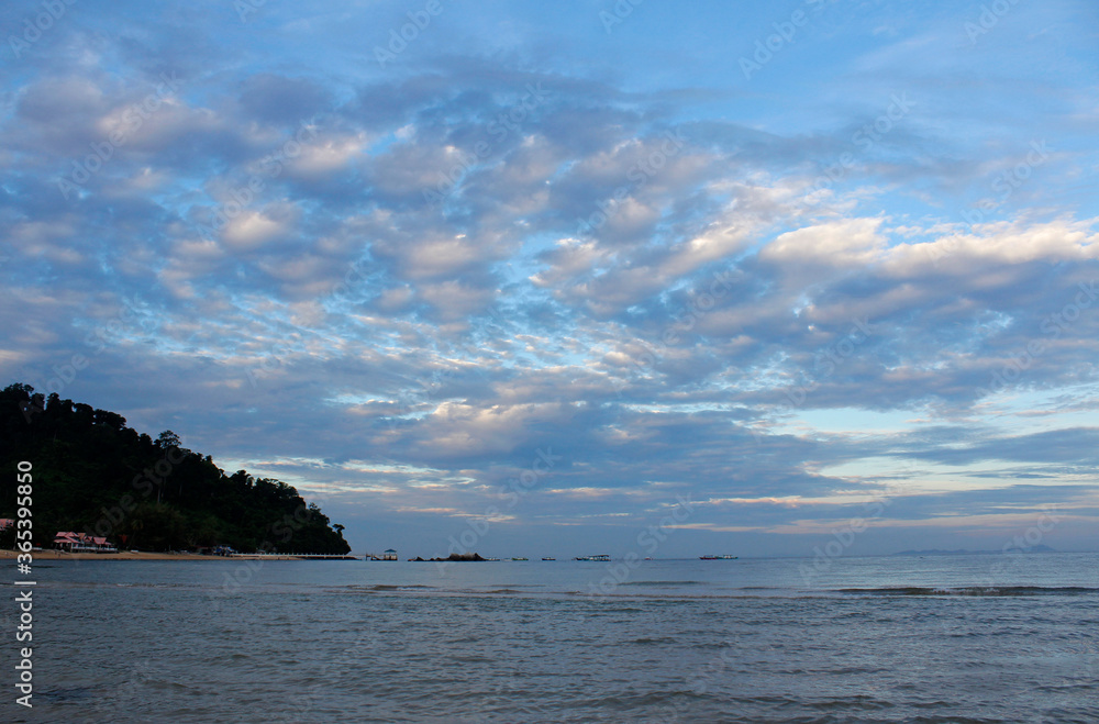 View of dawn at the seaside with the dramatic cloudscape, Tioman Island